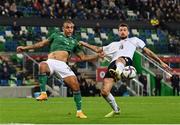 15 November 2021; Josh Magennis of Northern Ireland tussles for the ball with Francesco Acerbi of Italy during the FIFA World Cup 2022 Qualifier match between Northern Ireland and Italy at the National Football Stadium at Windsor Park in Belfast. Photo by Ramsey Cardy/Sportsfile