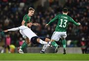 15 November 2021; Manuel Locatelli of Italy in action against Alistair McCann, left, and Corry Evans of Northern Ireland during the FIFA World Cup 2022 Qualifier match between Northern Ireland and Italy at the National Football Stadium at Windsor Park in Belfast. Photo by David Fitzgerald/Sportsfile