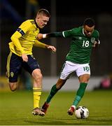 16 November 2021; Tyreik Wright of Republic of Ireland in action against Emil Holm of Sweden during the UEFA European U21 Championship qualifying group A match between Republic of Ireland and Sweden at Tallaght Stadium in Dublin. Photo by Seb Daly/Sportsfile