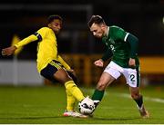 16 November 2021; Lee O'Connor of Republic of Ireland is tackled by Paulos Abraham of Sweden during the UEFA European U21 Championship qualifying group A match between Republic of Ireland and Sweden at Tallaght Stadium in Dublin. Photo by Eóin Noonan/Sportsfile