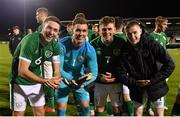 16 November 2021; Republic of Ireland players, from left, Conor Coventry, Brian Maher, Gavin Kilkenny and Ross Tierney celebrate after the UEFA European U21 Championship qualifying group A match between Republic of Ireland and Sweden at Tallaght Stadium in Dublin. Photo by Seb Daly/Sportsfile