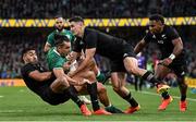 13 November 2021; James Lowe of Ireland is tackled by Reiko Ioane and Will Jordan of New Zealand during the Autumn Nations Series match between Ireland and New Zealand at Aviva Stadium in Dublin. Photo by Brendan Moran/Sportsfile