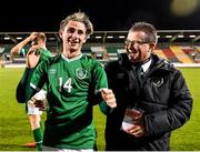 16 November 2021; Oliver O'Neill of Republic of Ireland and FAI Director of Communications Cathal Dervan after the UEFA European U21 Championship qualifying group A match between Republic of Ireland and Sweden at Tallaght Stadium in Dublin. Photo by Seb Daly/Sportsfile