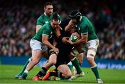 13 November 2021; Ireland players, from left, Jack Conan, James Lowe and Caelan Doris hold up Will Jordan of New Zealand to force a turnover during the Autumn Nations Series match between Ireland and New Zealand at Aviva Stadium in Dublin. Photo by Brendan Moran/Sportsfile