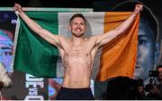 18 November 2021; Jason Quigley with the Irish tri-colour during the weigh-ins ahead of his WBO World Middleweight Title fight against Demetrius Andrade at the SNHU Arena in Manchester, New Hampshire, USA. Photo by Ed Mullholland / Matchroom Boxing via Sportsfile