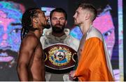18 November 2021; Jason Quigley, right, and Demetrius Andrade face-off after the weigh-ins ahead of their WBO World Middleweight Title fight at the SNHU Arena in Manchester, New Hampshire, USA. Photo by Ed Mullholland / Matchroom Boxing via Sportsfile