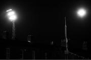 19 November 2021; (EDITORS NOTE: Image has been shot in black and white. Color version not available.) A general view of floodlights and a street light from outside the ground before the SSE Airtricity League First Division Play-Off Final match between Bray Wanderers and UCD at Dalymount Park in Dublin. Photo by Piaras Ó Mídheach/Sportsfile