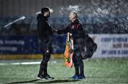 19 November 2021; Derry City manager Ruaidhri Higgins in conversation with Dundalk kit manager Noel Walsh before the SSE Airtricity League Premier Division match between Dundalk and Derry City at Oriel Park in Dundalk, Louth. Photo by Ben McShane/Sportsfile