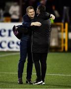 19 November 2021; Dundalk head coach Vinny Perth, left, and Derry City manager Ruaidhri Higgins embrace before the SSE Airtricity League Premier Division match between Dundalk and Derry City at Oriel Park in Dundalk, Louth. Photo by Ben McShane/Sportsfile