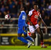 19 November 2021; Junior Quitirna of Waterford in action against James Abankwah of St Patrick's Athletic during the SSE Airtricity League Premier Division match between Waterford and St Patrick's Athletic at the RSC in Waterford. Photo by Eóin Noonan/Sportsfile