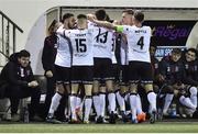 19 November 2021; Dundalk players celebrate with Dundalk head coach Vinny Perth, hidden, after their first goal during the SSE Airtricity League Premier Division match between Dundalk and Derry City at Oriel Park in Dundalk, Louth. Photo by Ben McShane/Sportsfile