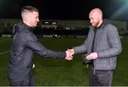 19 November 2021; Former Dundalk, and current Linfield player, Chris Shields, right, presents the Dundalk Goal of the Season award to outgoing Dundalk player Patrick McEleney at half-time of the SSE Airtricity League Premier Division match between Dundalk and Derry City at Oriel Park in Dundalk, Louth. Photo by Ben McShane/Sportsfile