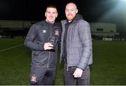 19 November 2021; Former Dundalk, and current Linfield player, Chris Shields, right, presents the Dundalk Goal of the Season award to outgoing Dundalk player Patrick McEleney at half-time of the SSE Airtricity League Premier Division match between Dundalk and Derry City at Oriel Park in Dundalk, Louth. Photo by Ben McShane/Sportsfile