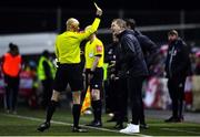 19 November 2021; Dundalk head coach Vinny Perth is booked by referee Neil Doyle during the SSE Airtricity League Premier Division match between Dundalk and Derry City at Oriel Park in Dundalk, Louth. Photo by Ben McShane/Sportsfile