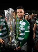 19 November 2021; Danny Mandroiu of Shamrock Rovers celebrates with the SSE Airtricity League Premier Division trophy after their match against Drogheda United at Tallaght Stadium in Dublin. Photo by Stephen McCarthy/Sportsfile