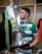 19 November 2021; Dylan Watts of Shamrock Rovers celebrates with the SSE Airtricity League Premier Division trophy after their match against Drogheda United at Tallaght Stadium in Dublin. Photo by Stephen McCarthy/Sportsfile