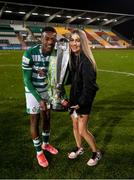 19 November 2021; Aidomo Emakhu of Shamrock Rovers with the SSE Airtricity League Premier Division trophy after their match against Drogheda United at Tallaght Stadium in Dublin. Photo by Stephen McCarthy/Sportsfile