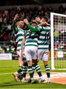 19 November 2021; Graham Burke of Shamrock Rovers, right, celebrates with team-mates Danny Mandroiu, left, and Dylan Watts after scoring their side's first goal during the SSE Airtricity League Premier Division match between Shamrock Rovers and Drogheda United at Tallaght Stadium in Dublin. Photo by Seb Daly/Sportsfile