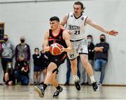 20 November 2021; Dylan Corkery of Tradehouse Central Ballincollig in action against Daniel Heaney of DBS Éanna during the InsureMyVan.ie Super League match between Tradehouse Central Ballincollig and DBS Éanna at Ballincollig Community School in Ballincollig, Cork. Photo by Sam Barnes/Sportsfile