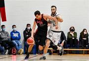 20 November 2021; Milorad Sedlarevic of Tradehouse Central Ballincollig in action against Mark Reynolds of DBS Éanna during the InsureMyVan.ie Super League match between Tradehouse Central Ballincollig and DBS Éanna at Ballincollig Community School in Ballincollig, Cork. Photo by Sam Barnes/Sportsfile