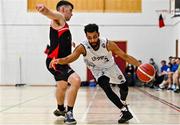 20 November 2021; Romonn Nelson of DBS Éanna in action against Dylan Corkery of Tradehouse Central Ballincollig during the InsureMyVan.ie Super League match between Tradehouse Central Ballincollig and DBS Éanna at Ballincollig Community School in Ballincollig, Cork. Photo by Sam Barnes/Sportsfile