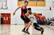 20 November 2021; Romonn Nelson of DBS Éanna in action against Dylan Corkery of Tradehouse Central Ballincollig during the InsureMyVan.ie Super League match between Tradehouse Central Ballincollig and DBS Éanna at Ballincollig Community School in Ballincollig, Cork. Photo by Sam Barnes/Sportsfile