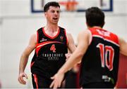 20 November 2021; Adrian O'Sullivan of Tradehouse Central Ballincollig celebrates a basket with team-mate Pau Camí Galera during the fourth quarter of the InsureMyVan.ie Super League match between Tradehouse Central Ballincollig and DBS Éanna at Ballincollig Community School in Ballincollig, Cork. Photo by Sam Barnes/Sportsfile