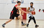 20 November 2021; Romonn Nelson of DBS Éanna in action against Adrian O'Sullivan of Tradehouse Central Ballincollig during the InsureMyVan.ie Super League match between Tradehouse Central Ballincollig and DBS Éanna at Ballincollig Community School in Ballincollig, Cork. Photo by Sam Barnes/Sportsfile