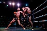 20 November 2021; Jonathan Haggerty, left, and Arthur Meyer competing in their ISKA Muay Thai Lightweight World Title bout during Capital 1 Dublin at the National Basketball Arena in Tallaght, Dublin. Photo by David Fitzgerald/Sportsfile