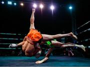 20 November 2021; Faisal Azimi, left, and Steve Archambault during their Muay Thai 64.5kg bout at Capital 1 Dublin in the National Basketball Arena, Tallaght, Dublin. Photo by David Fitzgerald/Sportsfile
