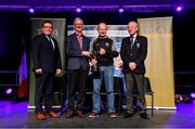 20 November 2021; Noel Joyce of JK Brackens, representing Tipperary and Munster, winner of the Aithriseoireacht/Scéalaíocht competition alongside Chathaoirleach Choiste Náisiúnta Scór Tomás Ó Muirí, left, Leinster GAA Chairman Pat Teehan, and Connacht GAA Council President John Murphy, right, during the Scór Sinsir 2020 All-Ireland Finals at the Connacht GAA Air Dome in Bekan, Mayo. Photo by Piaras Ó Mídheach/Sportsfile