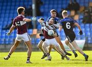 21 November 2021; Gary Rogers of St Columbas Mullinalaghta is tackled by Dan Cooney of Blessington during the AIB Leinster GAA Football Senior Club Championship First Round match between St Columbas Mullinalaghta and Blessington at Glennon Brothers Pearse Park in Longford. Photo by David Fitzgerald/Sportsfile