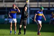 21 November 2021; Aaron Kenny of St Rynagh's, right, receives a yellow card from referee Kieran Dooley during the Offaly County Senior Club Hurling Championship Final match between Coolderry and St Rynagh's at Bord na Mona O'Connor Park in Tullamore, Offaly. Photo by Ben McShane/Sportsfile