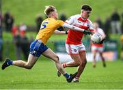 21 November 2021; Daithí Cosgrove of Belmullet in action against James Kelly of Knockmore during the Mayo County Senior Club Football Championship Final match between Knockmore and Belmullet at James Stephen's Park in Ballina, Mayo. Photo by Piaras Ó Mídheach/Sportsfile