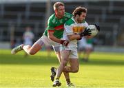 21 November 2021; Ross Peters of Clonmel Commercials in action against Noel McGrath of Loughmore-Castleiney during the Tipperary County Senior Club Football Championship Final match between Clonmel Commercials and Loughmore-Castleiney at Semple Stadium in Thurles, Tipperary. Photo by Michael P Ryan/Sportsfile