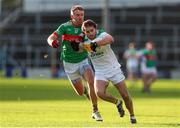 21 November 2021; Ross Peters of Clonmel Commercials in action against Noel McGrath of Loughmore-Castleiney during the Tipperary County Senior Club Football Championship Final match between Clonmel Commercials and Loughmore-Castleiney at Semple Stadium in Thurles, Tipperary. Photo by Michael P Ryan/Sportsfile