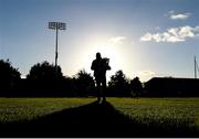 21 November 2021; Dublin county board official Paul Tobin brings out the cup ahead of the Go Ahead Dublin County Senior Club Football Championship Final match between St Jude's and Kilmacud Crokes at Parnell Park in Dublin. Photo by Daire Brennan/Sportsfile