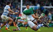 21 November 2021; Tadhg Beirne of Ireland offloads in a tackle by Francisco Gomez Kodela of Argentina during the Autumn Nations Series match between Ireland and Argentina at Aviva Stadium in Dublin. Photo by Brendan Moran/Sportsfile