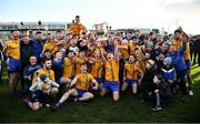 21 November 2021; Conor Flynn of Knockmore celebrates with the the Paddy Moclair Cup alongside his team-mates after their side's victory in the Mayo County Senior Club Football Championship Final match between Knockmore and Belmullet at James Stephen's Park in Ballina, Mayo. Photo by Piaras Ó Mídheach/Sportsfile