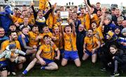 21 November 2021; Conor Flynn of Knockmore celebrates with the the Paddy Moclair Cup alongside his team-mates after their side's victory in the Mayo County Senior Club Football Championship Final match between Knockmore and Belmullet at James Stephen's Park in Ballina, Mayo. Photo by Piaras Ó Mídheach/Sportsfile