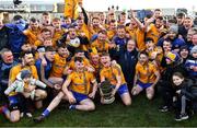 21 November 2021; Conor Flynn of Knockmore celebrates with the the Paddy Moclair Cup alongside his team-mates after their side's victory in the Mayo County Senior Club Football Championship Final match between Knockmore and Belmullet at James Stephen's Park in Ballina, Mayo. Photo by Piaras Ó Mídheach/Sportsfile