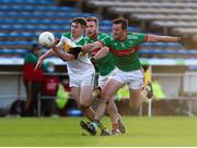 21 November 2021; Michael Quinlivan of Clonmel Commercials in action against John Ryan of Loughmore-Castleiney during the Tipperary County Senior Club Football Championship Final match between Clonmel Commercials and Loughmore-Castleiney at Semple Stadium in Thurles, Tipperary. Photo by Michael P Ryan/Sportsfile