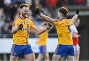 21 November 2021; Knockmore players Shane McHale, left, and David McHale celebrate after their side's victory in the Mayo County Senior Club Football Championship Final match between Knockmore and Belmullet at James Stephen's Park in Ballina, Mayo. Photo by Piaras Ó Mídheach/Sportsfile