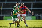 21 November 2021; Darragh Burke of St Thomas' in action against Gavin Lally of Gort during the Galway County Senior Club Hurling Championship Semi-Final match between Gort and St Thomas' at Pearse Stadium in Salthill, Galway. Photo by Ray Ryan/Sportsfile