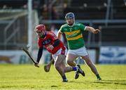 21 November 2021; Damien McGlynn of St Thomas' in action against Sylvie Og Linnane of Gort during the Galway County Senior Club Hurling Championship Semi-Final match between Gort and St Thomas' at Pearse Stadium in Salthill, Galway. Photo by Ray Ryan/Sportsfile