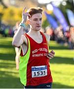21 November 2021; Nicholas Griggs of Mid Ulster AC, Derry, celebrates winning the Junior Men's event during the Irish Life Health National Cross Country Championships at Santry Demense in Dublin. Photo by Ramsey Cardy/Sportsfile
