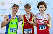 21 November 2021; The podium in the Junior Men's event, from left, third placed Scott Fagan of Metro/St Brigid's AC, Dublin, first placed Nicholas Griggs of Mid Ulster AC, Derry, and second placed Dean Casey of Ennis Track AC, Clare, during the Irish Life Health National Cross Country Championships at Santry Demense in Dublin. Photo by Ramsey Cardy/Sportsfile