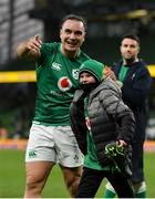 21 November 2021; James Lowe of Ireland gives his boots to a young supporter after the Autumn Nations Series match between Ireland and Argentina at Aviva Stadium in Dublin. Photo by Seb Daly/Sportsfile