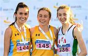21 November 2021; The podium after the Women's U23 race, from left, third placed Danielle Donegan of UCD AC, Dublin, first placed Sarah Healy of UCD AC, Dublin, and second placed Aoife Ó Cuill of St Coca's AC, Kildare, during the Irish Life Health National Cross Country Championships at Santry Demense in Dublin. Photo by Ramsey Cardy/Sportsfile