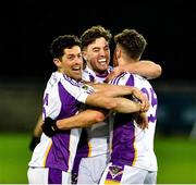 21 November 2021; Kilmacud Crokes' players, left to right, Rory O'Carroll, Andrew McGowan, and Conor Casey celebrate after the Go Ahead Dublin County Senior Club Football Championship Final match between St Jude's and Kilmacud Crokes at Parnell Park in Dublin. Photo by Daire Brennan/Sportsfile